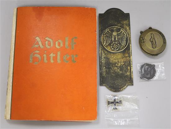 A group of WWII German items including a book on Adolf Hitler